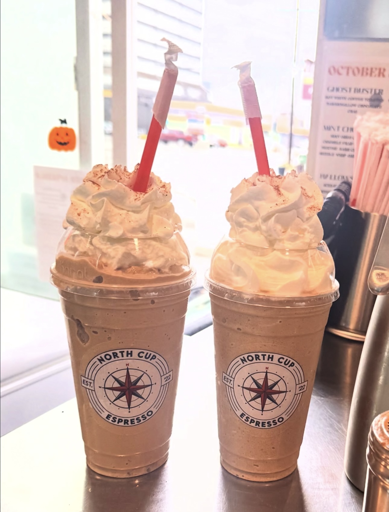 Two blended North Cup Espresso drinks topped with whipped cream