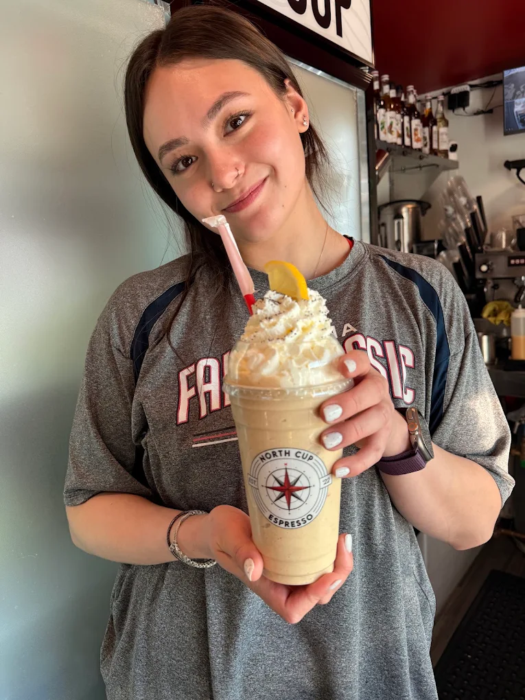 Barista holding a blended North Cup Espresso drink
